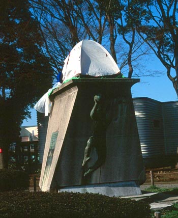 Homeless man's tent on Olympics monument, Yokohama